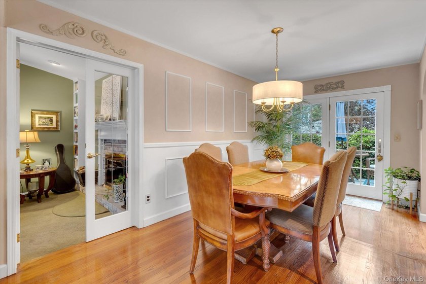 Welcome to this beautifully updated 4-bedroom, 2-bath Cape that - photo 5