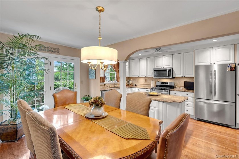 Welcome to this beautifully updated 4-bedroom, 2-bath Cape that - photo 6