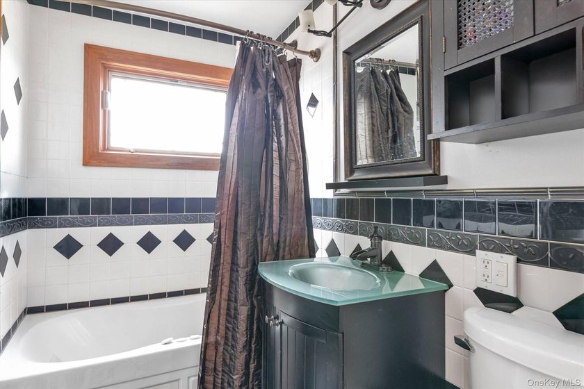 Welcome to this stunning expanded ranch located in the highly - photo 18