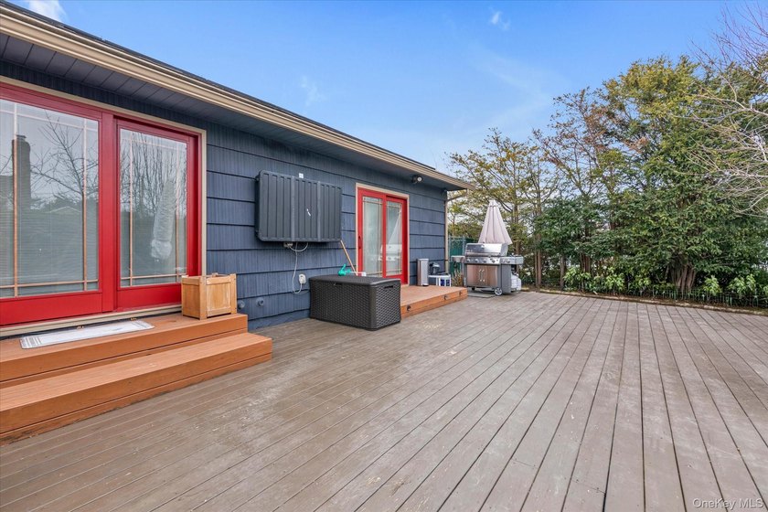 Welcome to this stunning expanded ranch located in the highly - photo 23