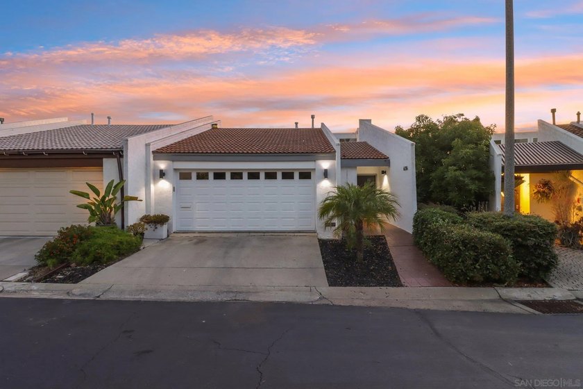 Tucked into the gated enclave of Del Cerro Heights, this fully - photo 2