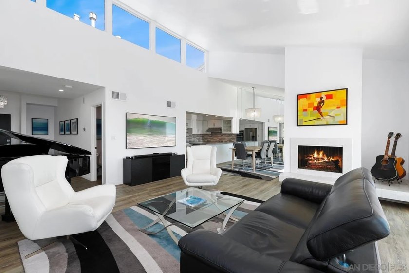 Tucked into the gated enclave of Del Cerro Heights, this fully - photo 3