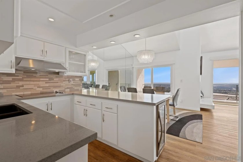 Tucked into the gated enclave of Del Cerro Heights, this fully - photo 6