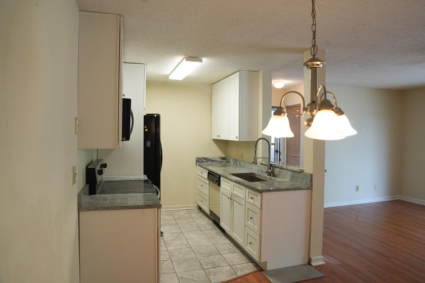 Located in Myrtle Beach, this 3-bedroom, 2 full bathroom condo - photo 6