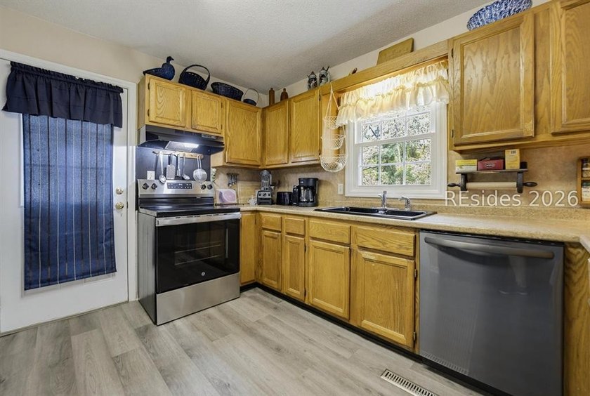 Located on Lady's Island, this two story home has a traditional - photo 21
