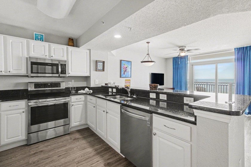 Experience coastal living at its finest in this beautifully - photo 9