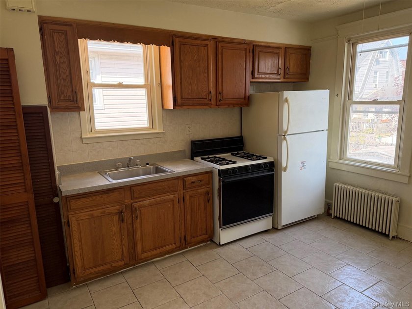 Don't miss your chance to own this legal two-family home - photo 12
