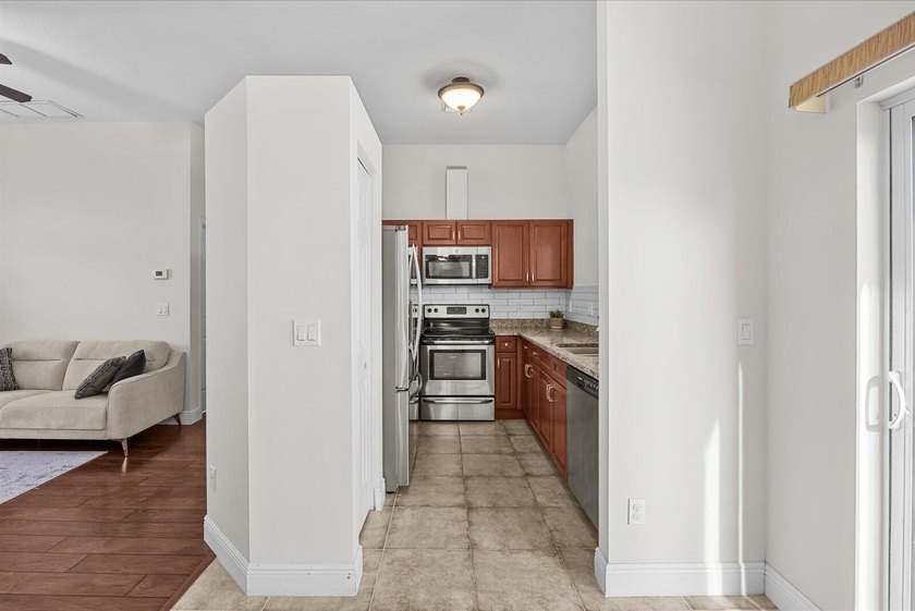 Welcome to this charming 3-bedroom, 2-bathroom home offering - photo 9