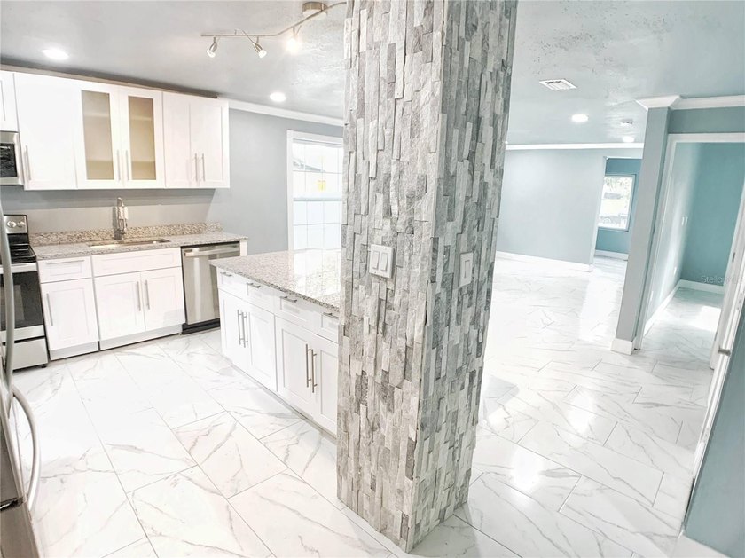 Experience modern luxury in this stunning, fully renovated - photo 11