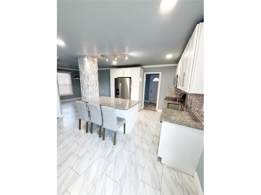 Experience modern luxury in this stunning, fully renovated - photo 13