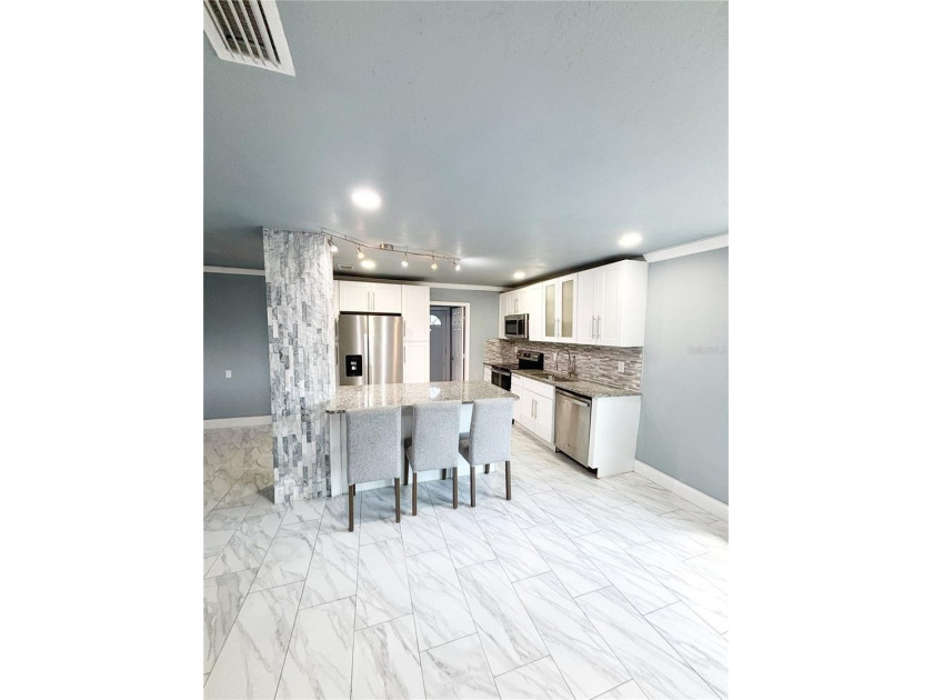 Experience modern luxury in this stunning, fully renovated - photo 17