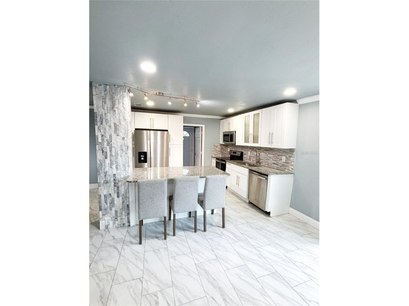 Experience modern luxury in this stunning, fully renovated - photo 18