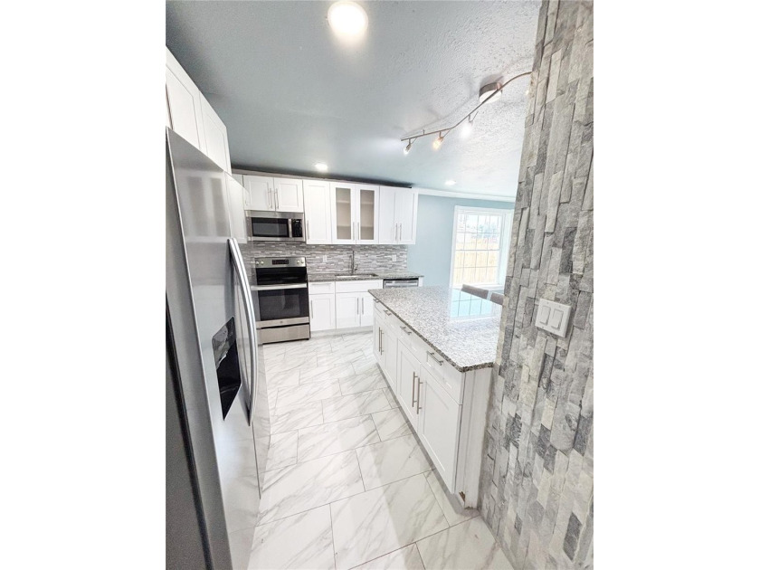 Experience modern luxury in this stunning, fully renovated - photo 26
