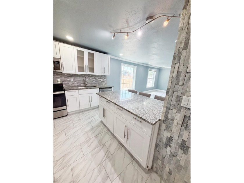 Experience modern luxury in this stunning, fully renovated - photo 29