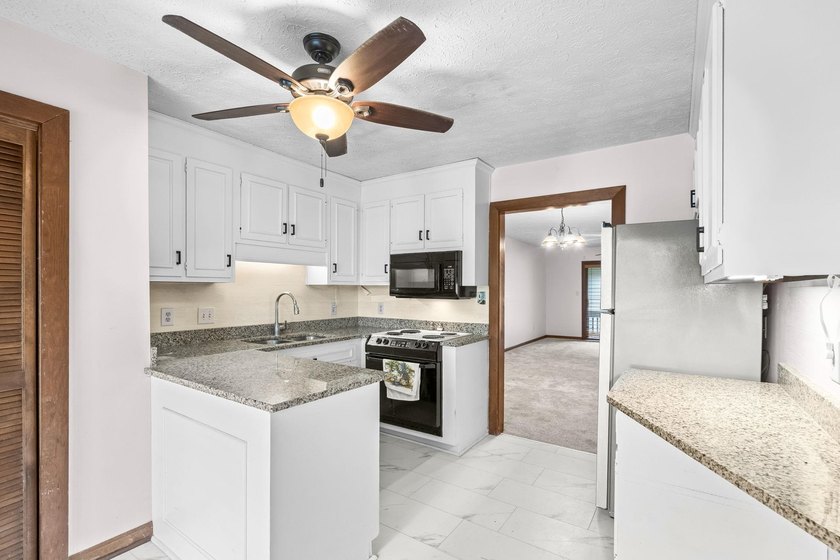 Unit 301 at Spinnaker's Reach is a spacious top-floor condo - photo 11