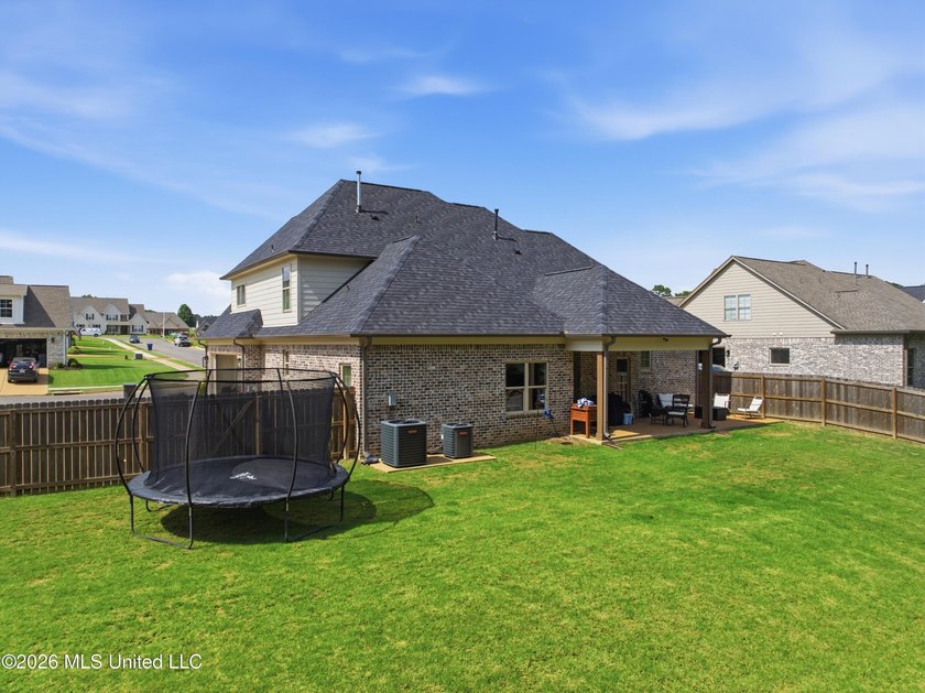 BETTER THAN NEW ~ One Owner 5 Bedroom, 3 Bath Home Situated on a - photo 35