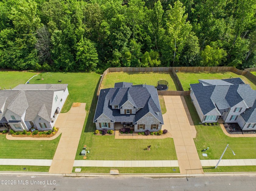 BETTER THAN NEW ~ One Owner 5 Bedroom, 3 Bath Home Situated on a - photo 38