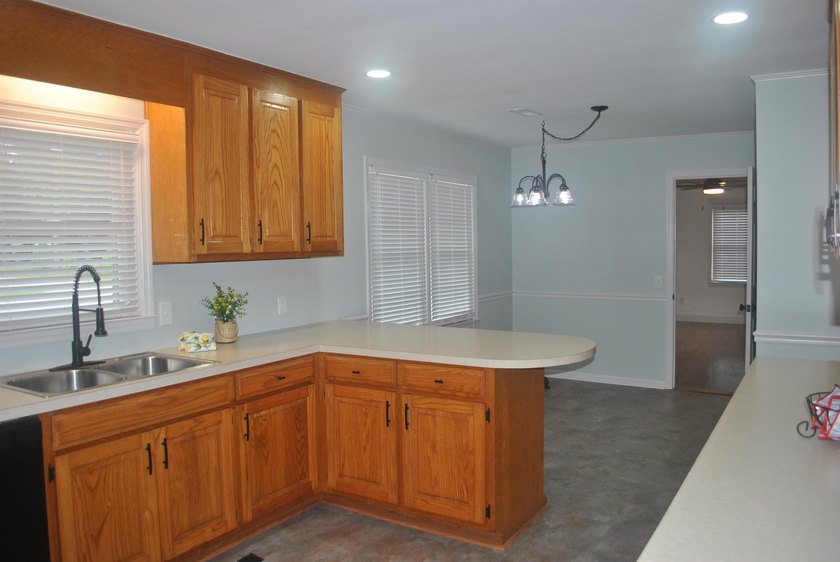 Welcome home to this charming 3-bedroom, 1-bath home in the - photo 8