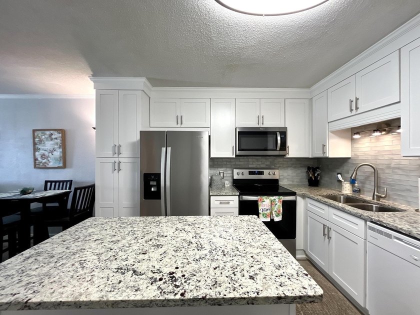 Wake up to ocean views in this beautifully updated 2BR/2BA condo - photo 6