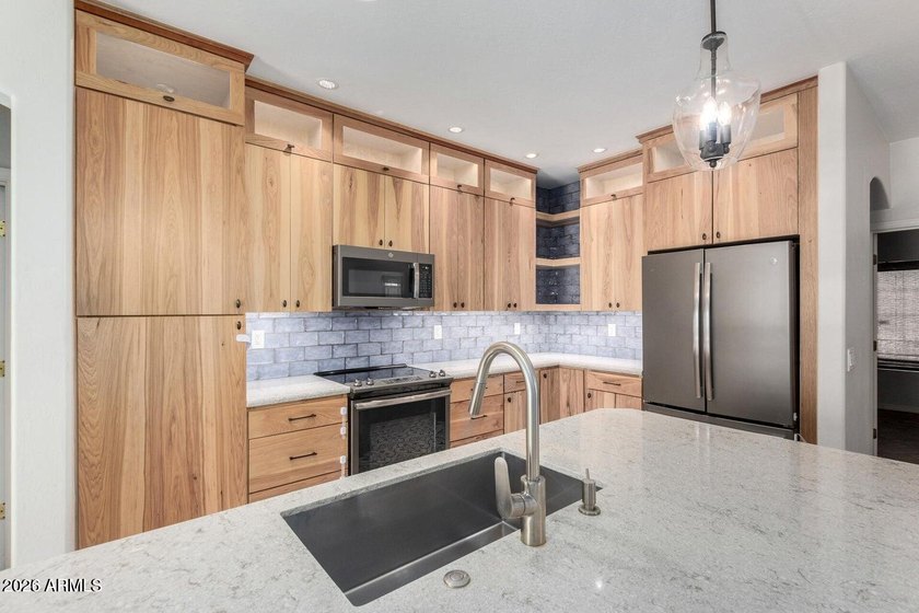 This resort-style living house meets everyday convenience at the - photo 11