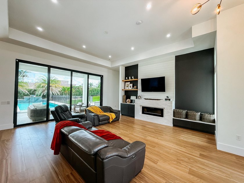 Welcome to 1702 Ludlow Road, a custom home situated on an - photo 15