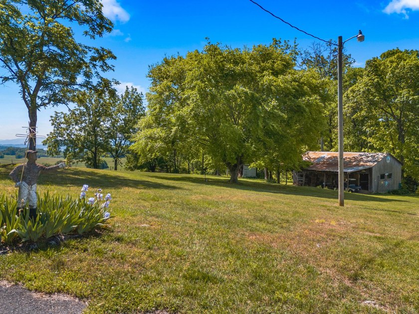 Welcome home to 1456 C H Rankin Road in White Pine -- a rare - photo 43