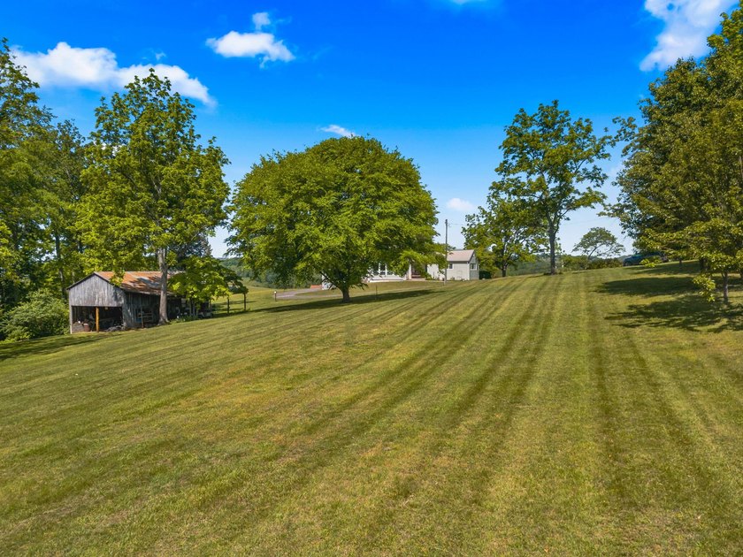 Welcome home to 1456 C H Rankin Road in White Pine -- a rare - photo 46