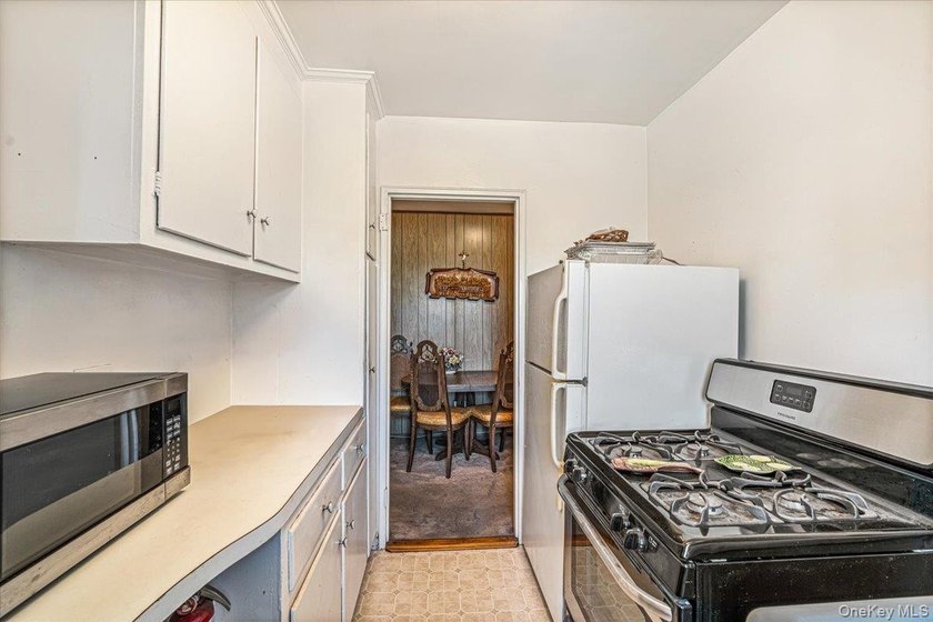 Welcome to this bright and inviting 2-bedroom, 1-bath co-op in - photo 8