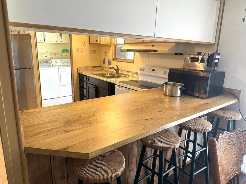 PRICED TO SELL AND FULL OF POTENTIAL!!! THIS 2-BEDROOM - photo 10