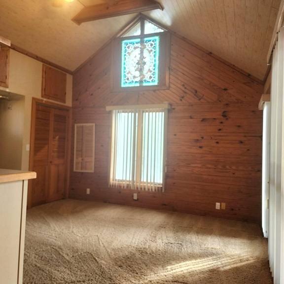 A picture-perfect retreat! A home nestled on a wooded lot - photo 9