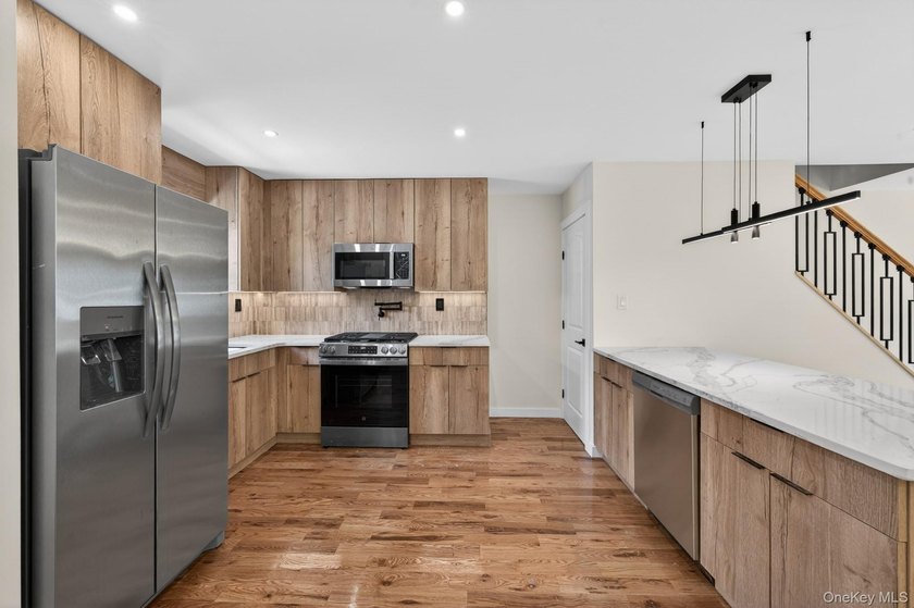 Experience modern living at its finest in this stunning newly - photo 3