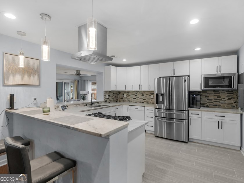 Lakefront Living! Experience serene lakefront living in this - photo 17