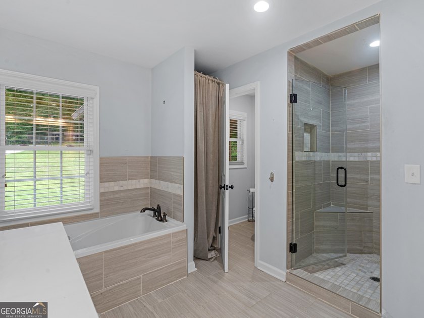 Lakefront Living! Experience serene lakefront living in this - photo 45