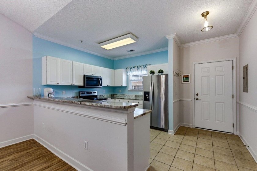 Welcome to your perfect beach retreat! This beautifully - photo 2