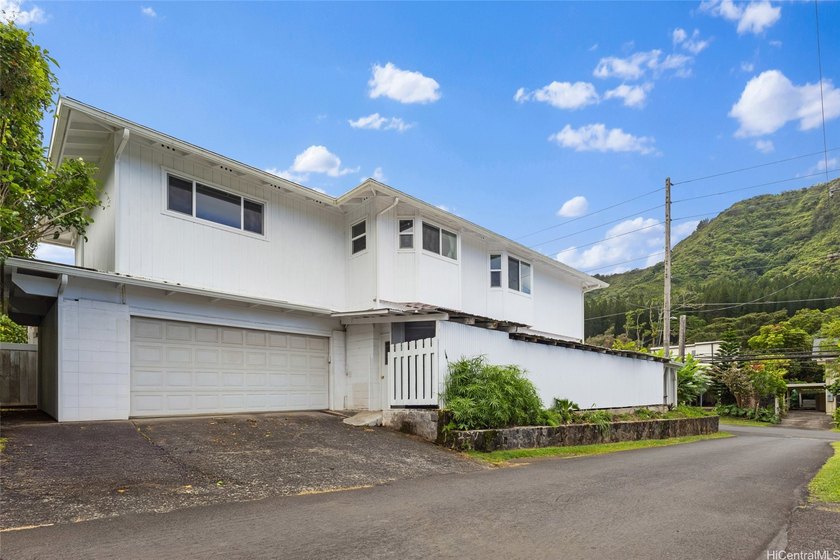 Nestled against the tranquil backdrop of the Ko'olau Range, this - photo 5
