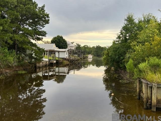 WATERFRONT PROPERTY! Escape the hustle and enjoy peaceful - photo 2