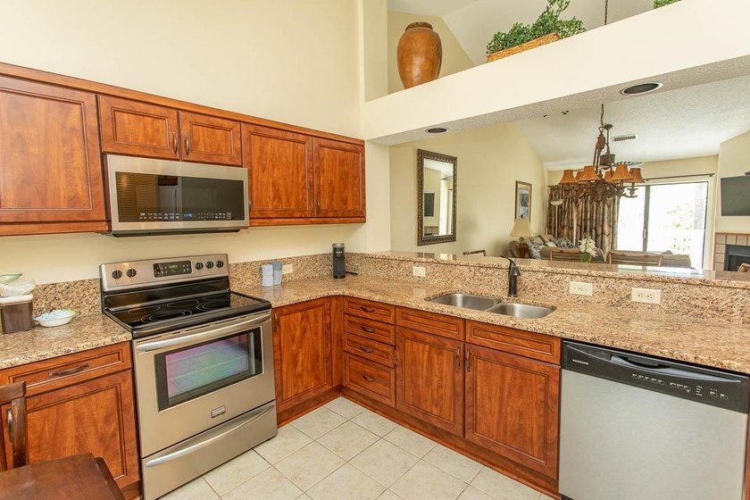 This stunning two-bedroom, two-bath, second floor villa offers - photo 7