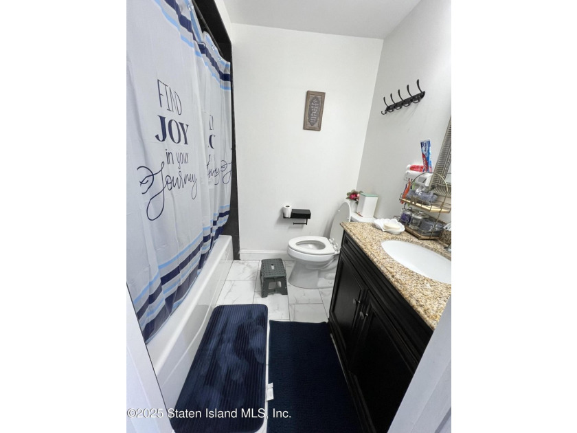 Two-family 2600+ square foot home. The main unit consists of a - photo 11