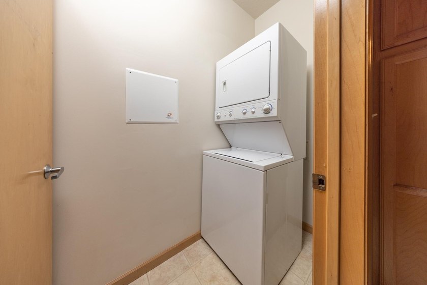 This beautiful condo is a standout with its soaring 16-foot - photo 10