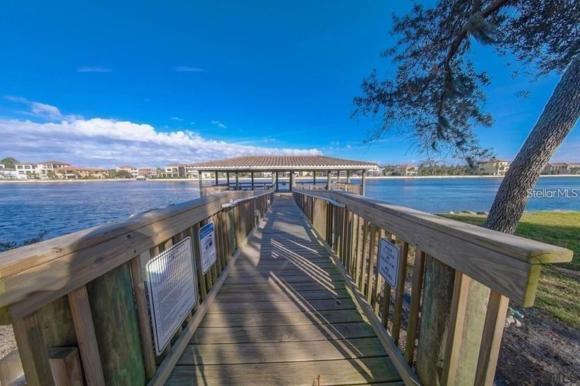 Lakefront home site in the desirable Tidelands community on the - photo 6