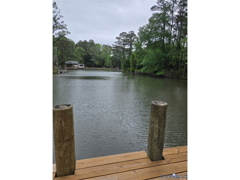 Three lots totaling 1.16 acres with waterfront and pier on Lanes - photo 5