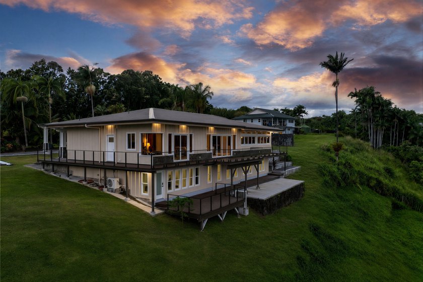 A newly reimagined oceanfront masterpiece perched above the - photo 29