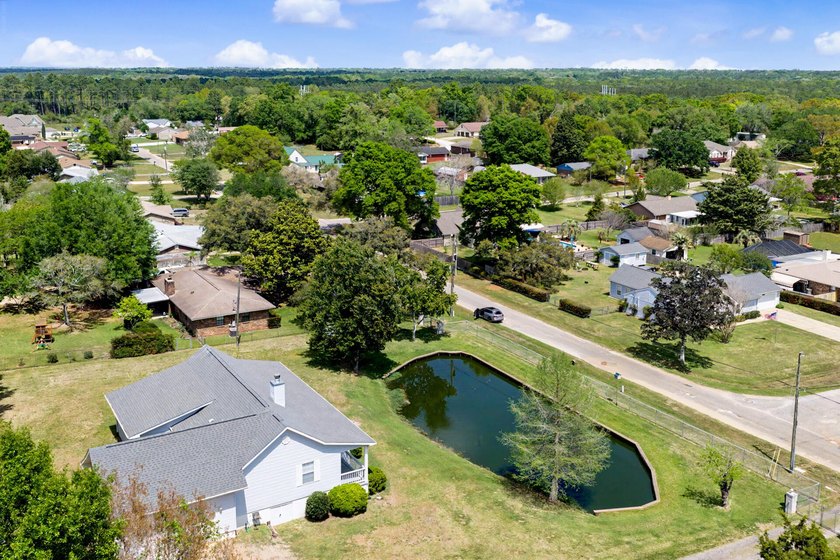 Discover peaceful country living just minutes from Pensacola - photo 6
