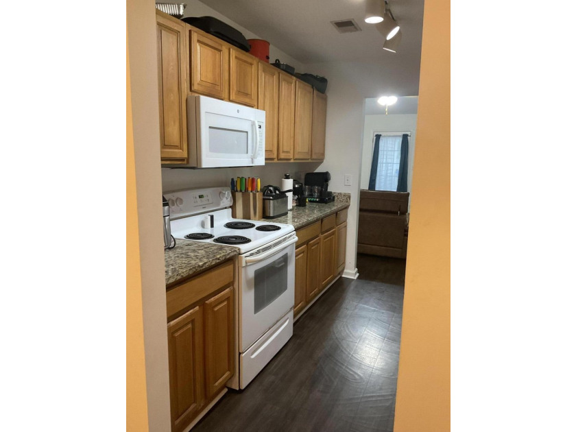 Experience this spacious 3BR/2BA townhouse, featuring upgraded - photo 6