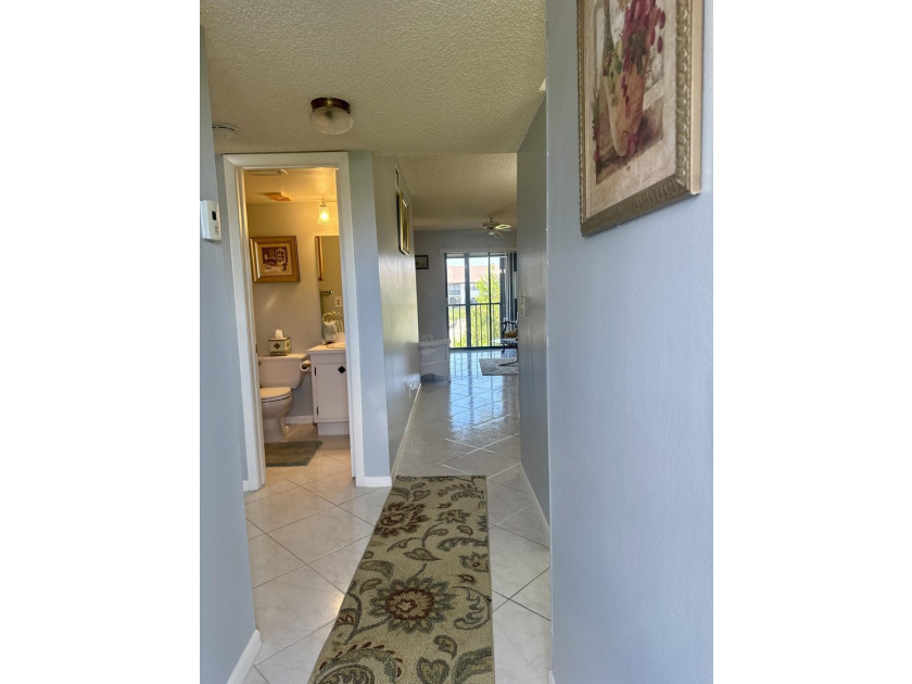 Welcome home to your well-maintained 2BR/2BA condo just steps - photo 4