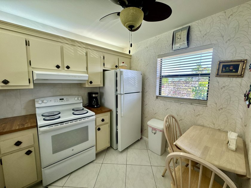 Welcome home to your well-maintained 2BR/2BA condo just steps - photo 8