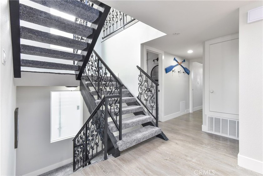 This stunning three-level waterfront home on Sunset Island - photo 13