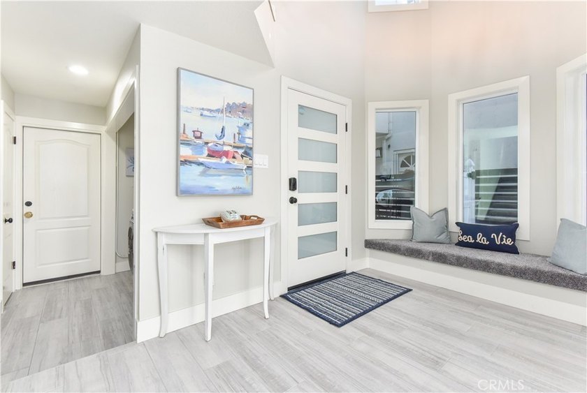 This stunning three-level waterfront home on Sunset Island - photo 17