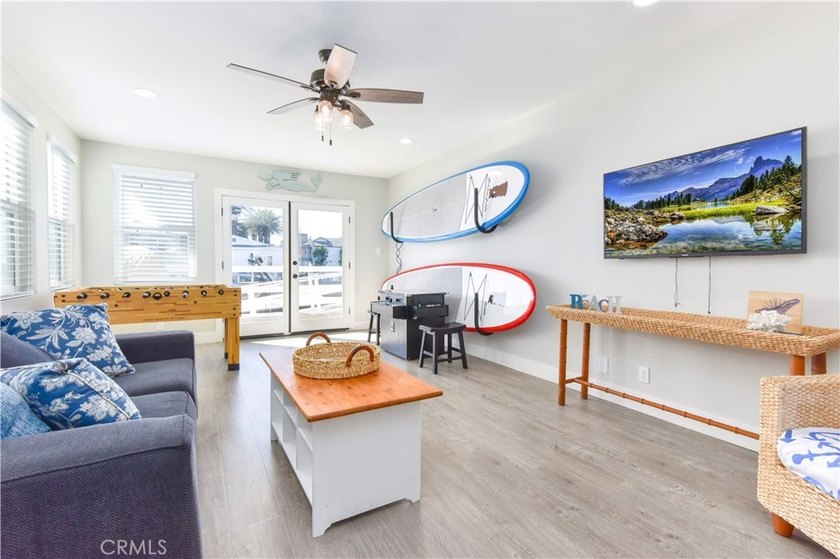 This stunning three-level waterfront home on Sunset Island - photo 19