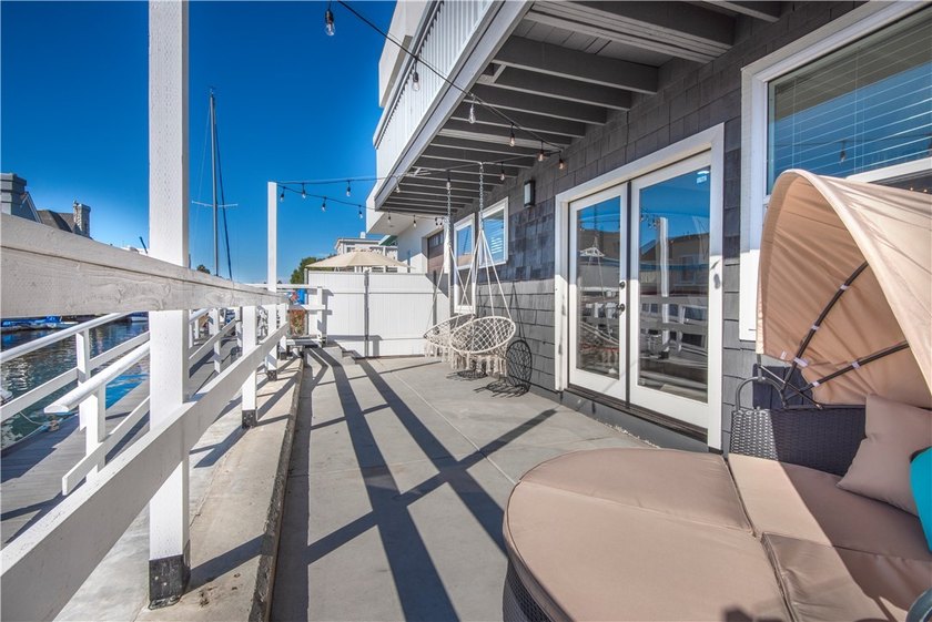This stunning three-level waterfront home on Sunset Island - photo 23